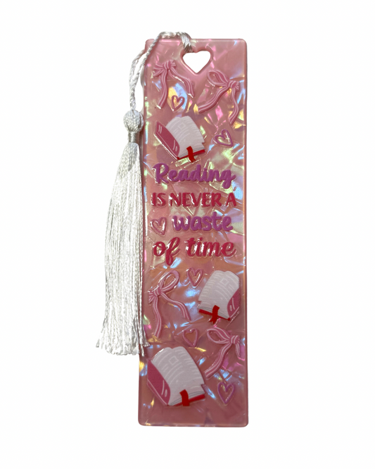 Reading is never a waste of time pink acrylic bookmark